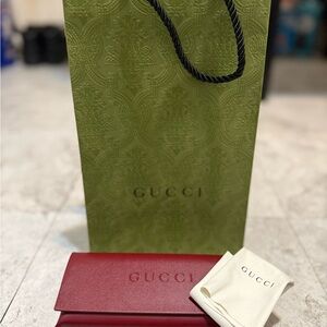 Gucci Burgundy Eyeglasses case with Olive Gucci Gift Bag.